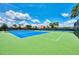 Two tennis courts and two pickleball courts at 20296 Bandera Pl, Venice, FL 34293