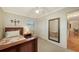 Small bedroom with twin bed, built-in closet and full-length mirror at 2264 Floyd St, Sarasota, FL 34239