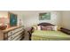 Bedroom with daybed, decorative pillows, and neutral decor at 2264 Floyd St, Sarasota, FL 34239