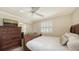 Comfortable bedroom with a dresser and a large bed at 2264 Floyd St, Sarasota, FL 34239