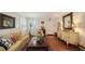 Bright living room featuring hardwood floors and comfortable furniture at 2264 Floyd St, Sarasota, FL 34239