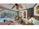 Relaxing wicker furniture near the pool and screened enclosure at 2264 Floyd St, Sarasota, FL 34239