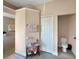 Clean bathroom with toilet, shower, and linen storage at 25072 Palisade Rd, Punta Gorda, FL 33983