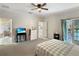 Spacious bedroom with ensuite bathroom access and backyard view at 25072 Palisade Rd, Punta Gorda, FL 33983