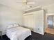 Comfortable bedroom with a double bed and built-in closet at 25072 Palisade Rd, Punta Gorda, FL 33983