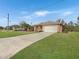 Nice curb appeal, two-car garage, and spacious driveway at 25072 Palisade Rd, Punta Gorda, FL 33983