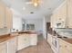 Kitchen boasts ample counter space and white cabinets at 25072 Palisade Rd, Punta Gorda, FL 33983