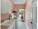 Laundry room with washer, dryer, and access to the garage at 25072 Palisade Rd, Punta Gorda, FL 33983
