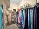 Spacious walk-in closet with ample shelving and hanging space at 25072 Palisade Rd, Punta Gorda, FL 33983