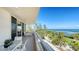 Spacious balcony offering stunning waterfront views and relaxing seating at 3080 Grand Bay Blvd # 521, Longboat Key, FL 34228