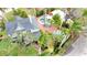 Aerial view of a house and surrounding landscape with a pool at 320 29Th Nw St, Bradenton, FL 34205