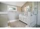 Elegant bathroom with double vanity and walk-in shower at 320 29Th Nw St, Bradenton, FL 34205