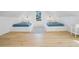 Spacious bedroom with two twin beds and hardwood floors at 320 29Th Nw St, Bradenton, FL 34205