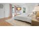 Main bedroom with hardwood floors and large windows at 320 29Th Nw St, Bradenton, FL 34205