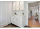White built-in cabinetry with glass doors, quartz countertops and ample storage at 320 29Th Nw St, Bradenton, FL 34205