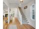 Bright entryway with hardwood floors and staircase at 320 29Th Nw St, Bradenton, FL 34205