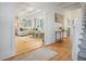 Bright and spacious entryway with hardwood floors and a view of the living room at 320 29Th Nw St, Bradenton, FL 34205