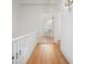 Bright hallway with hardwood floors and access to bathroom at 320 29Th Nw St, Bradenton, FL 34205