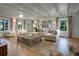 Light-filled living room with hardwood floors, comfortable seating, and stylish decor at 320 29Th Nw St, Bradenton, FL 34205