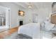 Spacious bedroom with hardwood floors and fireplace at 320 29Th Nw St, Bradenton, FL 34205