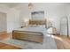 Main bedroom with wood floors and neutral decor at 320 29Th Nw St, Bradenton, FL 34205