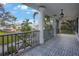 Porch with patterned tile and view of backyard at 320 29Th Nw St, Bradenton, FL 34205