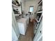 Laundry room with shelving and additional storage at 4521 85Th N Ave, Pinellas Park, FL 33781