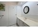 Second bathroom with a vanity and tiled shower/tub combo at 4531 13Th E St, Ellenton, FL 34222
