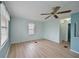 Light and airy bedroom with ceiling fan and laminate flooring at 4531 13Th E St, Ellenton, FL 34222