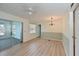 Bright dining room with chandelier and laminate flooring at 4531 13Th E St, Ellenton, FL 34222
