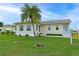 Single-story house with palm tree and well-maintained lawn at 4531 13Th E St, Ellenton, FL 34222