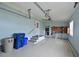 Spacious garage with built-in workbench and ample storage at 4531 13Th E St, Ellenton, FL 34222