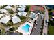 Aerial perspective of community pool, shuffleboard, and tennis courts at 4726 Independence Dr # 4726, Bradenton, FL 34210