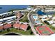 Aerial view of community, highlighting pool and tennis courts at 4726 Independence Dr # 4726, Bradenton, FL 34210