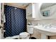 Clean bathroom with shower/tub combo, vanity, and tile flooring at 4726 Independence Dr # 4726, Bradenton, FL 34210