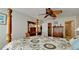 Bedroom with a wooden dresser and en-suite bathroom access at 4726 Independence Dr # 4726, Bradenton, FL 34210