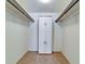 Large walk-in closet with additional storage cabinet at 4726 Independence Dr # 4726, Bradenton, FL 34210