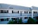 Condo building exterior, highlighting the unit's entrance at 4726 Independence Dr # 4726, Bradenton, FL 34210