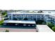Exterior view of condo building showcasing parking at 4726 Independence Dr # 4726, Bradenton, FL 34210