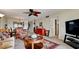 Living room features a comfortable seating area and a large TV at 4726 Independence Dr # 4726, Bradenton, FL 34210