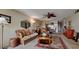 Relaxing living room with wicker furniture and area rug at 4726 Independence Dr # 4726, Bradenton, FL 34210