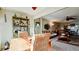 Bright sunroom with wicker furniture and view of living room at 4726 Independence Dr # 4726, Bradenton, FL 34210