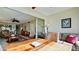 Spacious sunroom offers additional living space with wood table at 4726 Independence Dr # 4726, Bradenton, FL 34210