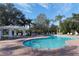 Resort-style pool with plenty of lounge chairs at 5160 Northridge Rd # 107, Sarasota, FL 34238