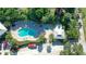 Aerial view showing pool, spa, and surrounding landscape at 5311 Gulf Of Mexico Dr # 3, Longboat Key, FL 34228