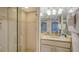 Bathroom with shower and granite countertop at 5311 Gulf Of Mexico Dr # 3, Longboat Key, FL 34228