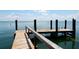 Spacious wooden dock extending over calm waters at 5311 Gulf Of Mexico Dr # 3, Longboat Key, FL 34228