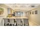 Kitchen with granite countertops and stainless steel appliances at 5311 Gulf Of Mexico Dr # 3, Longboat Key, FL 34228