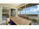 Enjoy ocean views from this screened lanai, complete with outdoor dining furniture at 5311 Gulf Of Mexico Dr # 3, Longboat Key, FL 34228
