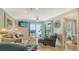 Living room with ocean view and access to patio at 5311 Gulf Of Mexico Dr # 3, Longboat Key, FL 34228